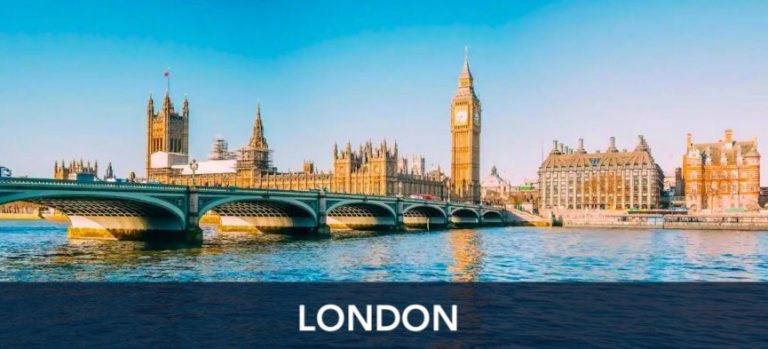 A panoramic view of London showcasing the iconic Big Ben and the Houses of Parliament next to a clear sky. In the foreground, Westminster Bridge crosses the River Thames.